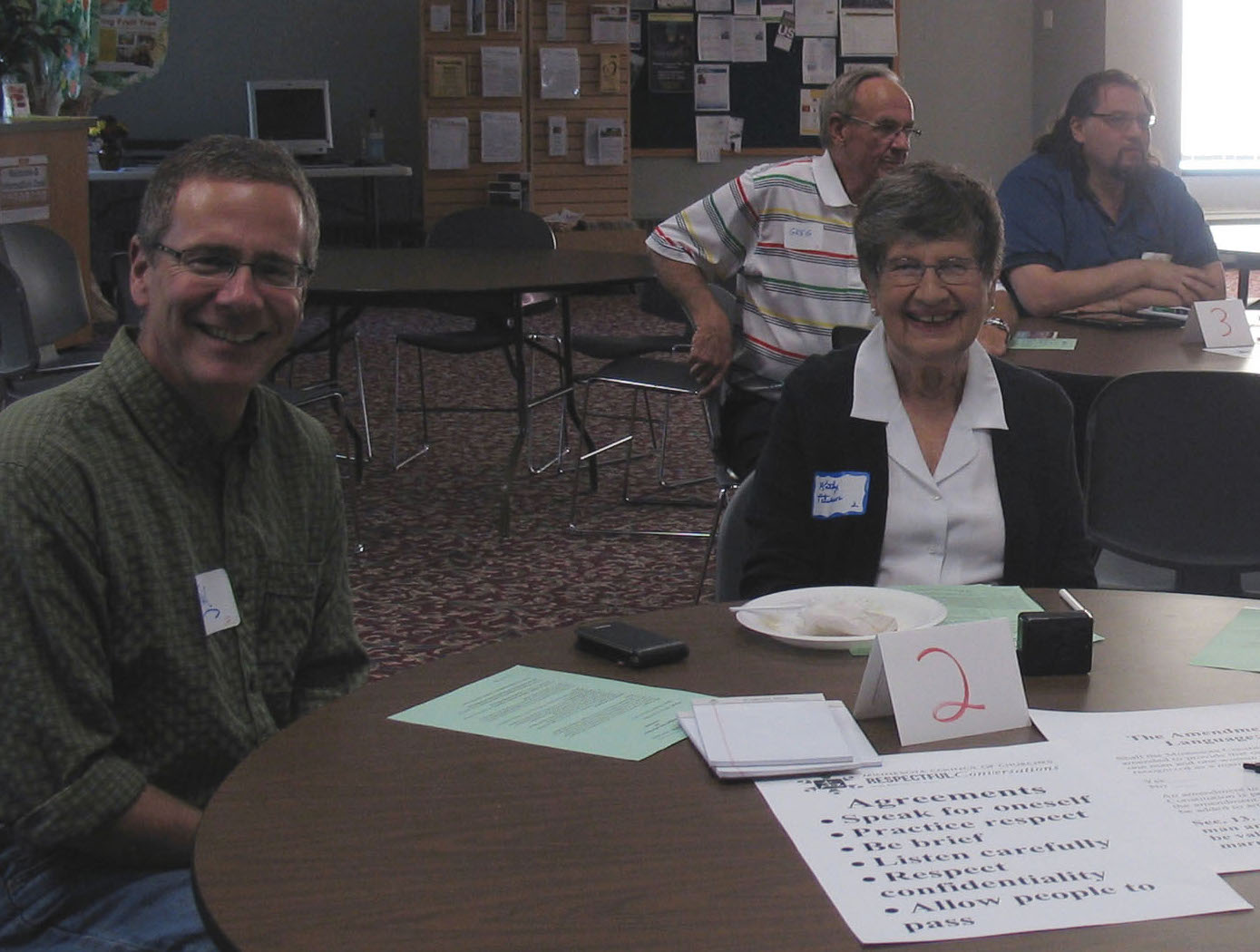 Burnsville Respectful Conversation table participants pose for picture